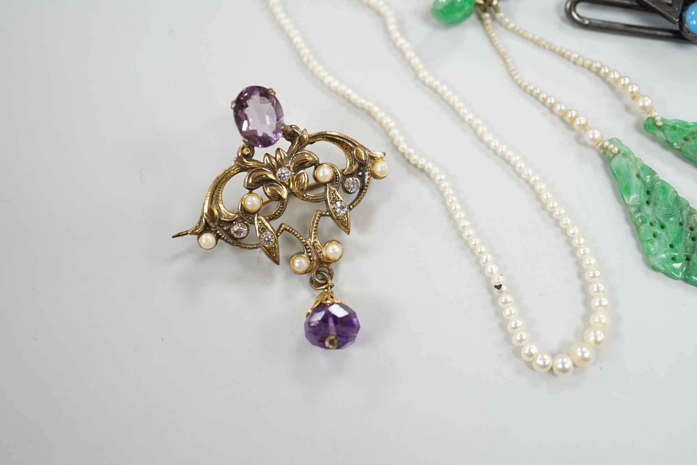A pair of yellow metal, jade and seed pearl set drop earrings, 7cm, a seed pearl necklace with 9ct clasp, a belt section and a paste set brooch.